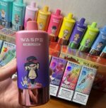 Vaper holding WASPE 4 in 1 100K puff pod vaping lifestyle